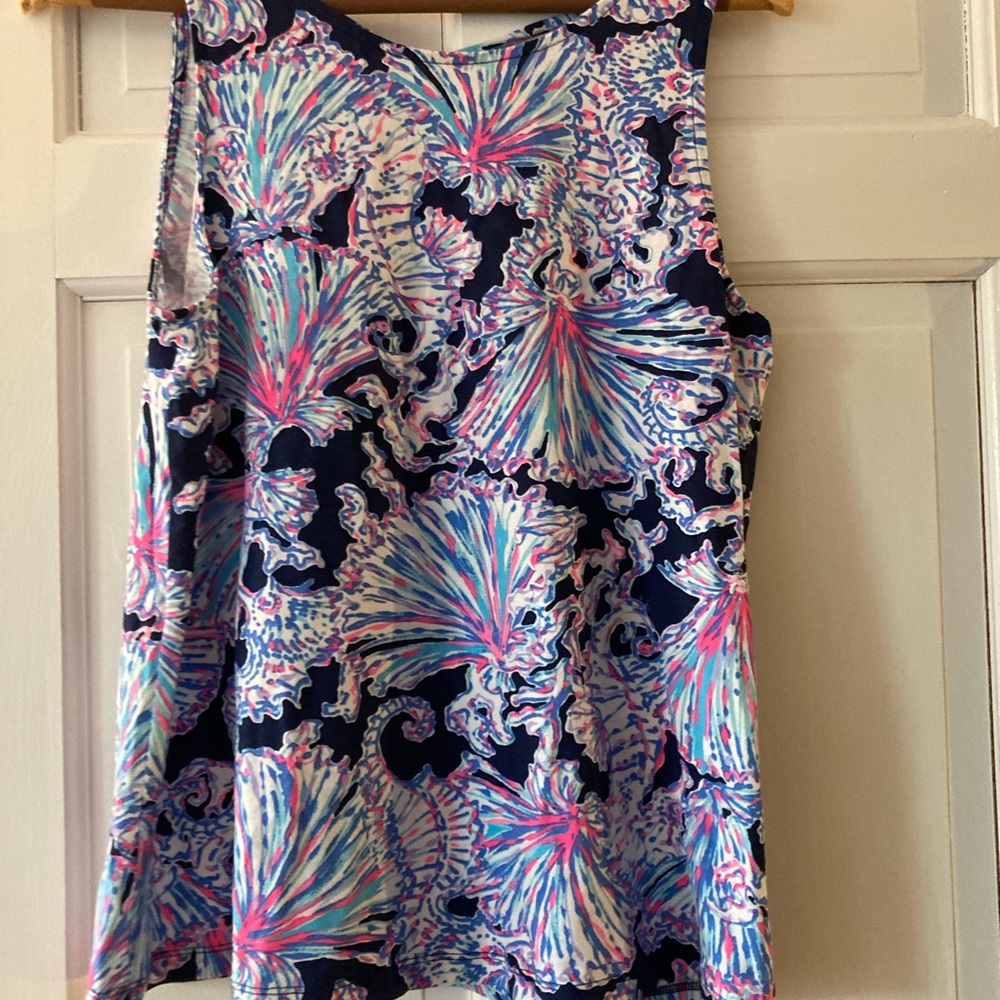 Lily Pulitzer never worn as I have two!! This style is very complimentary.